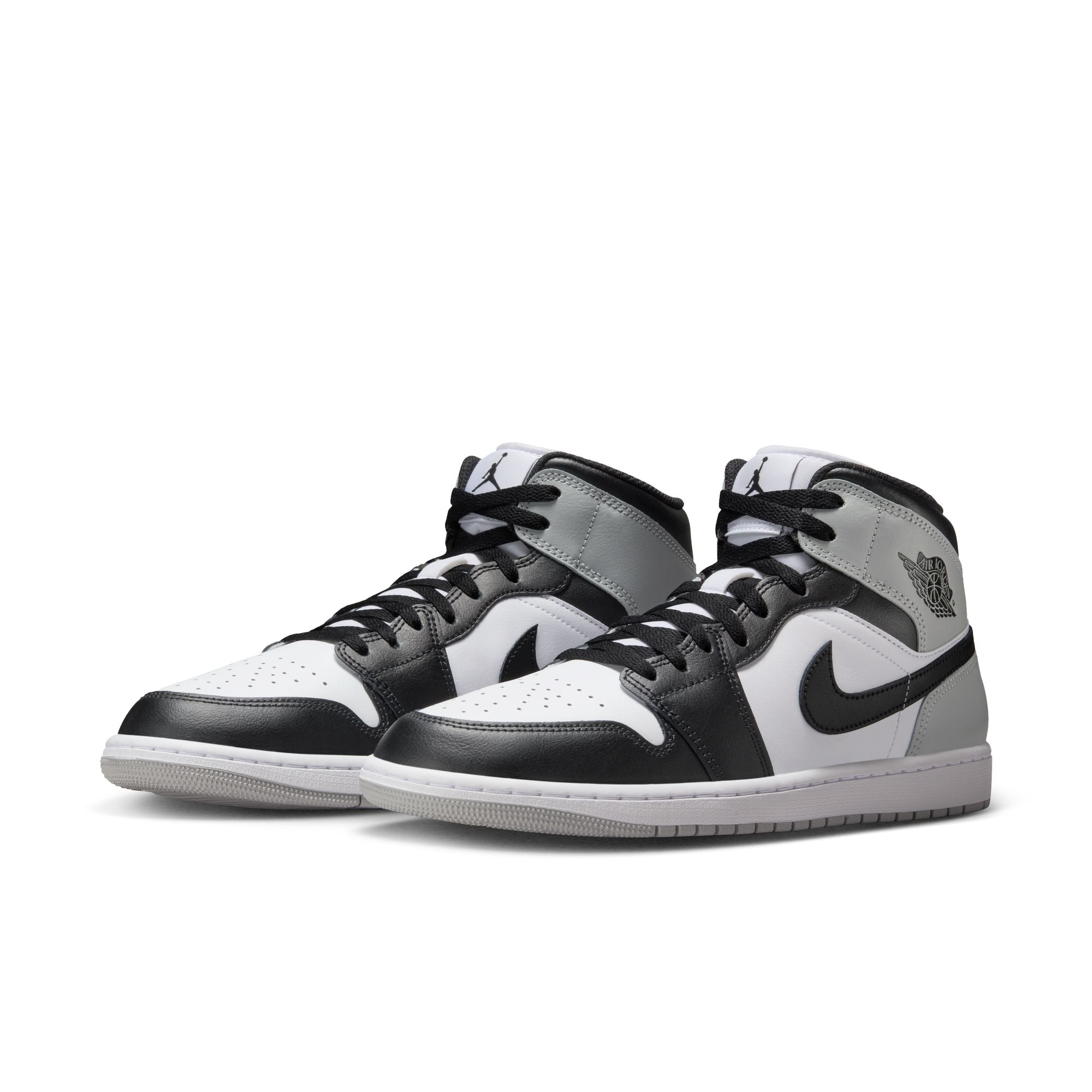 Air Jordan 1 Mid men’s sneakers in White, Black, and Smoke Grey side view