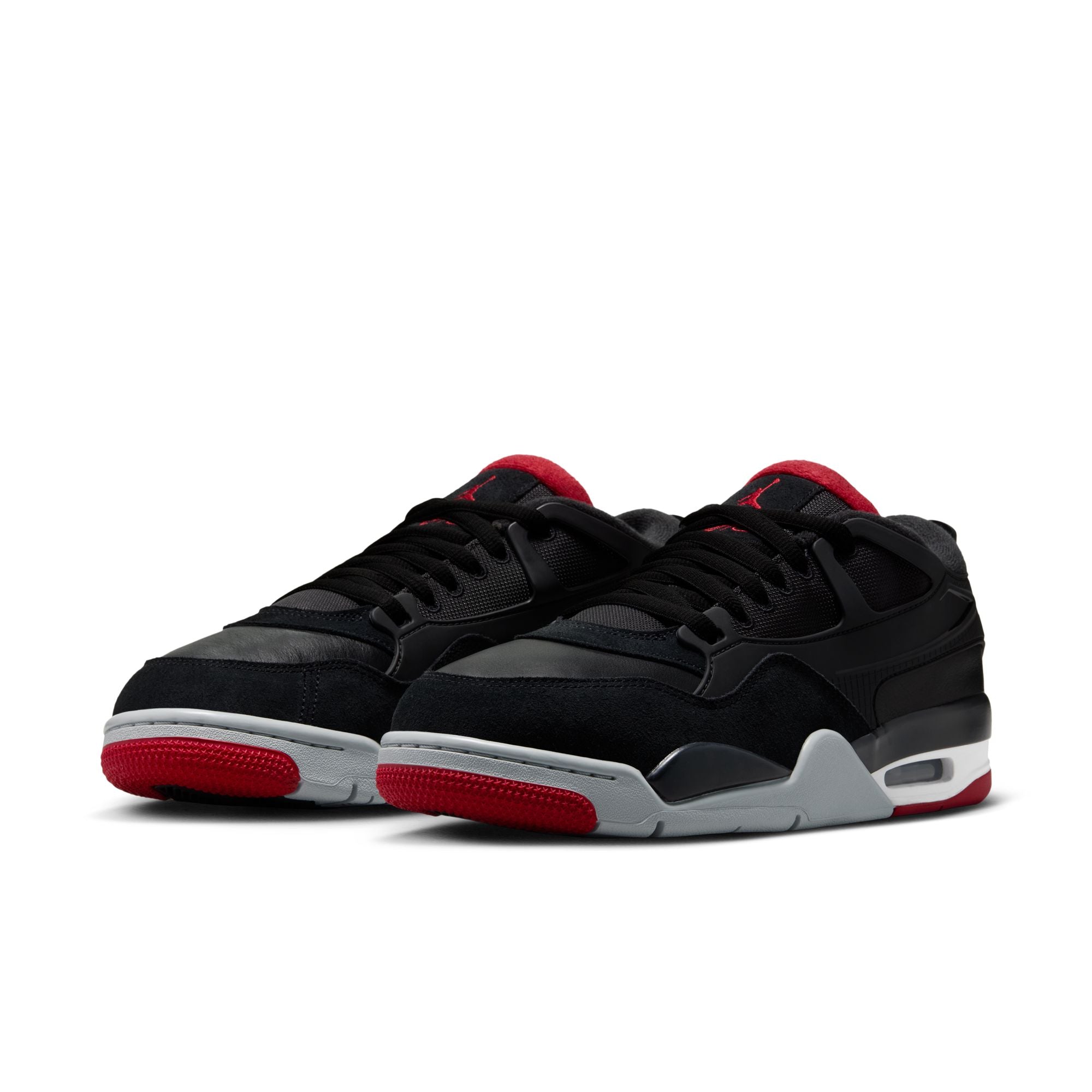 Air Jordan 4 RM men’s sneakers in Black with Varsity Red accents and visible Air unit side angle view