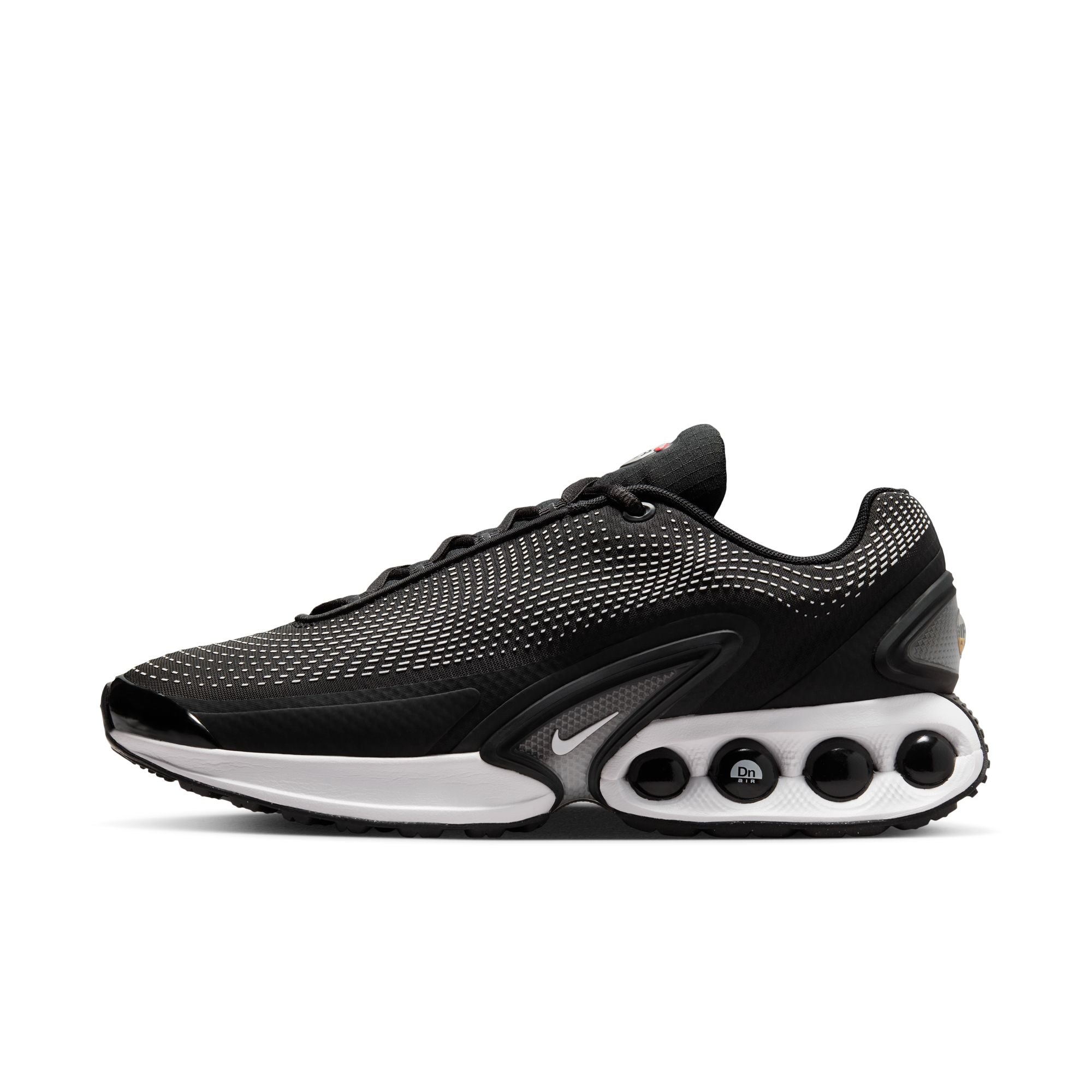 Nike Air Max DN in black with wolf grey accents and dynamic Air cushioning pods