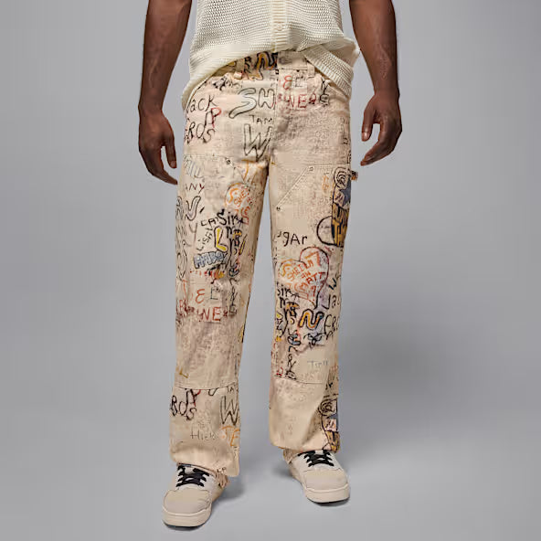 Air Jordan Carpenter Pants men’s in Tan with multi-color graphic print front view